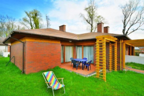 Holiday house with a garden near the sea Sarbinowo
